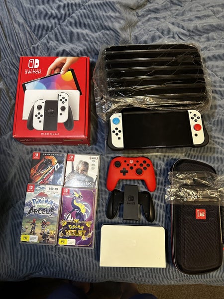 nintendo switch Oled + games + accessories Carousel 1
