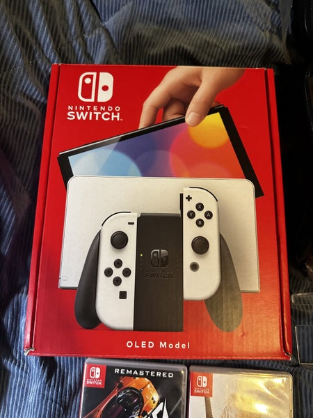 nintendo switch Oled + games + accessories Carousel 7