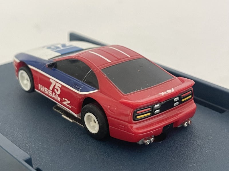 AFX TOMY NISSAN 300ZX #75 SLOT CAR Carousel 2