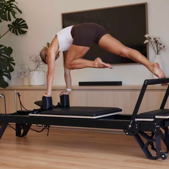 Odyssey High Leg Pilates Reformer Carousel 1