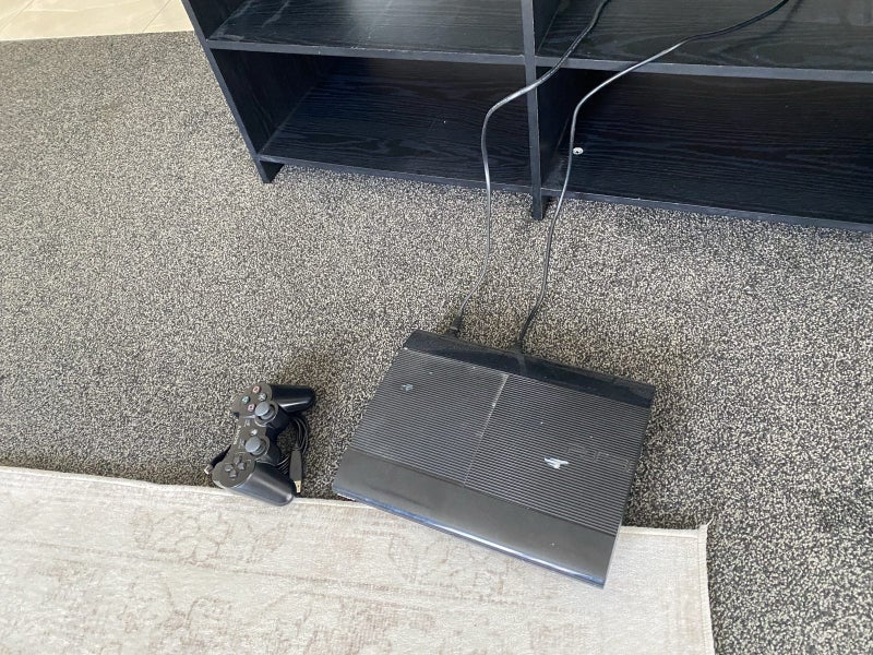 PS3 with Controller and Cables Carousel 1