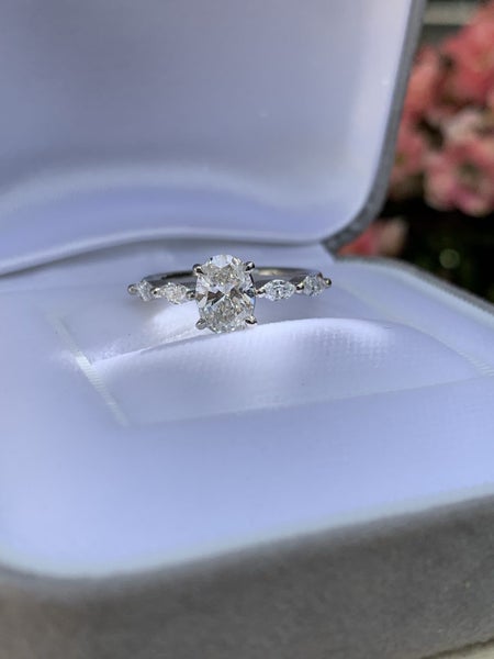 1ct oval cut lab grown diamond ring with marquise side stones in platinum Carousel 1