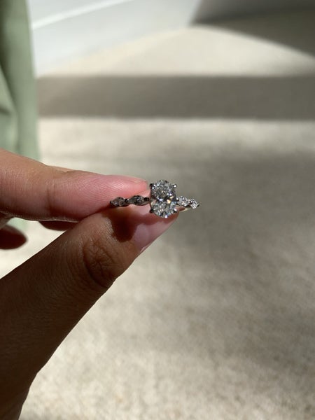 1ct oval cut lab grown diamond ring with marquise side stones in platinum Carousel 10