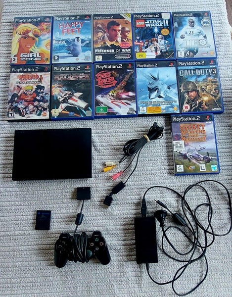 PS2 console, controller, memory card & games bundle Carousel 1