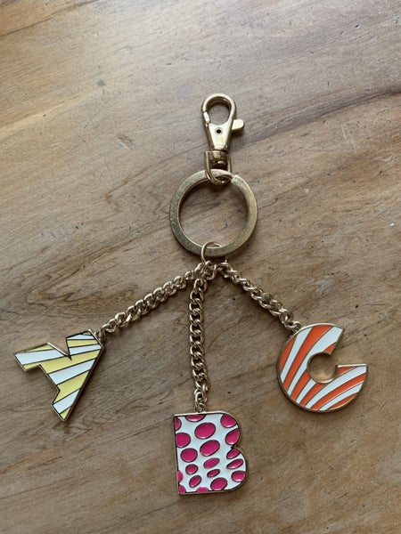Karen Walker Rare Alphabet KeyChain Carousel 1