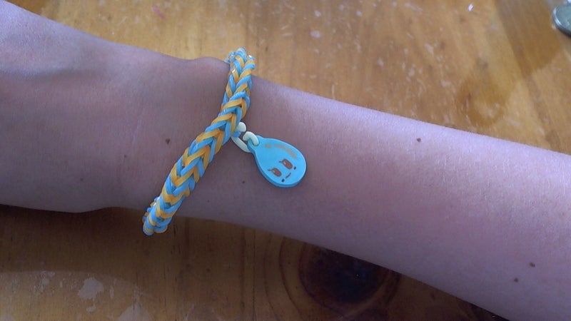 Blue and orange loom band bracelet with water drop charm Carousel 2