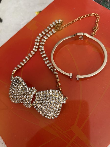 Rhinestone covered bow tie necklace & gold tone bracelet Carousel 1
