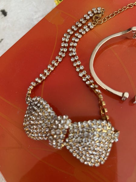 Rhinestone covered bow tie necklace & gold tone bracelet Carousel 2
