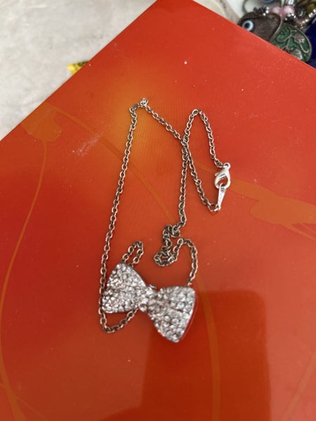 Rhinestone covered bow tie necklace & gold tone bracelet Carousel 5