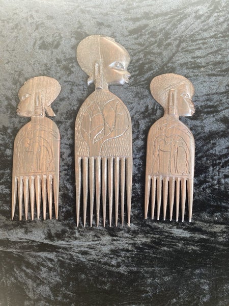 vintage African carved wooden combs, also known as afro picks. Carousel 1