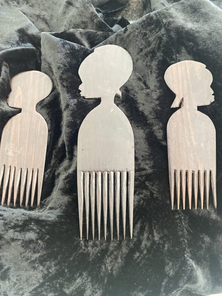 vintage African carved wooden combs, also known as afro picks. Carousel 3