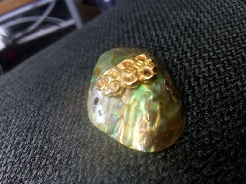 Paua with gold tone tiki Carousel 1