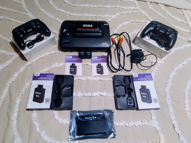 Sega master system ll with AV Ports & Wireless Controllers Carousel 1