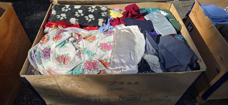 $1 = RES Wooden crate #21 assorted material, possibly linen etc Carousel 1