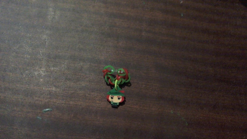 Red and green loom band ring with robinhood charm Carousel 1
