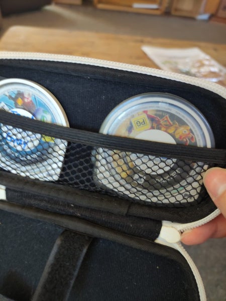 Working PSP 2002 Slim (with charger), four games and a case. Carousel 2