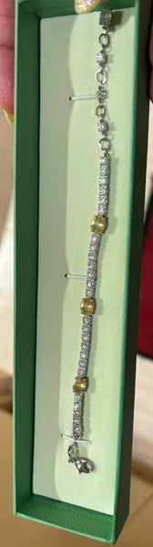 Swarovski white n yellow shimmery bracelet Carousel 1