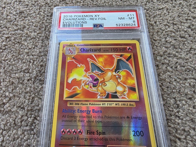 2016 Reverse Foil Charizard #11 PSA 8 Carousel 1