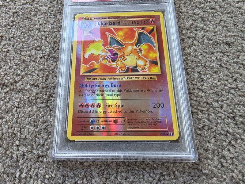 2016 Reverse Foil Charizard #11 PSA 8 Carousel 2