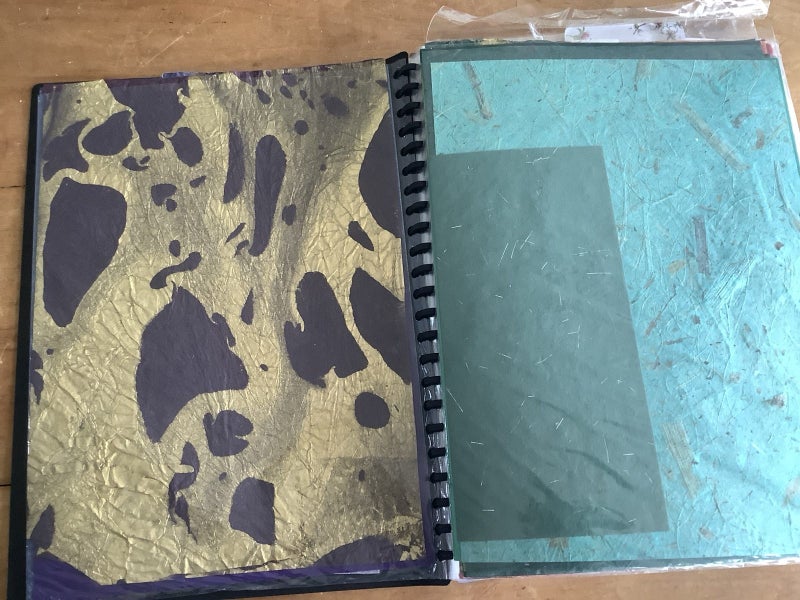 Bulk scrapbook paper, Embelishments and some instruction manuals Carousel 2