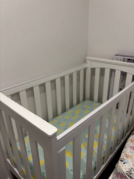 White wooden cot Carousel 2