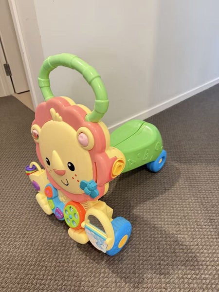 Fisher-Price Lion Walker & Ride-On Toy with Music & Lights Carousel 4