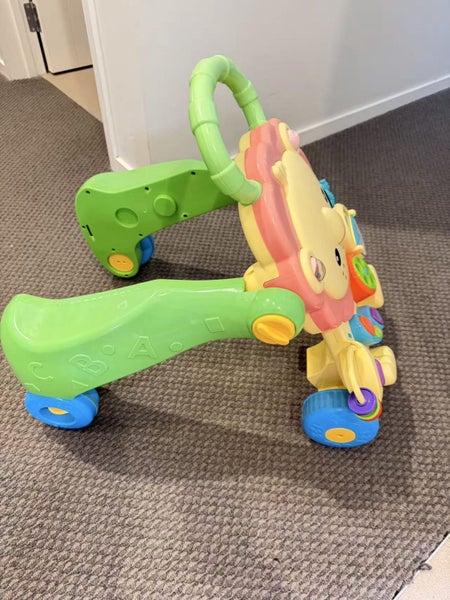 Fisher-Price Lion Walker & Ride-On Toy with Music & Lights Carousel 2