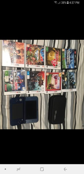 Nintendo new 3DS XL with games, charger, case Carousel 1