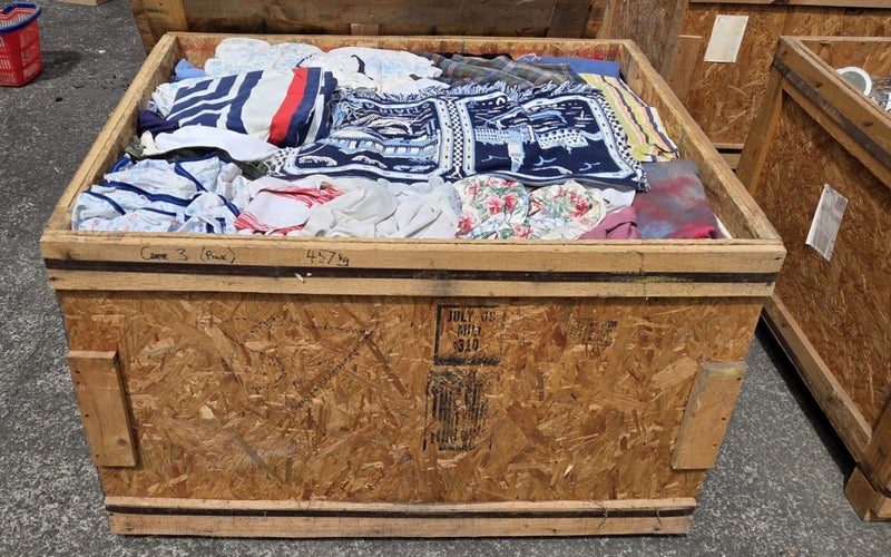 $1 = RES Wooden crate #87 assorted material, curtains & possibly linen etc Carousel 1