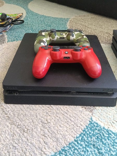 PS 4 console and Controllers Carousel 1