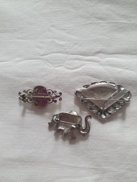 3 Brooches including Elephant. Carousel 2