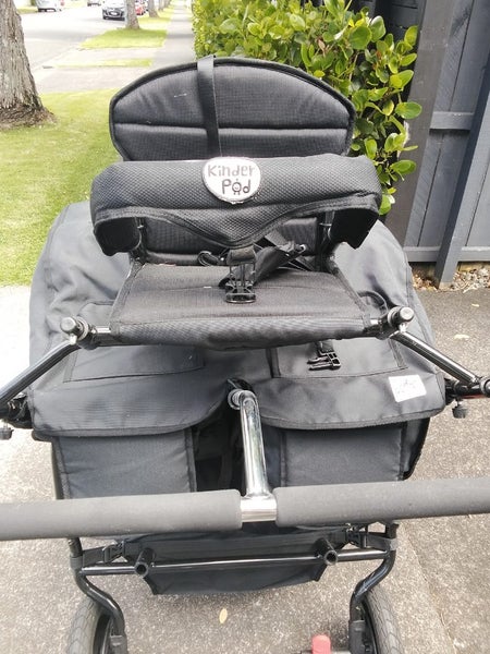 Multi seat stroller for three .room for fourth attachment Carousel 2