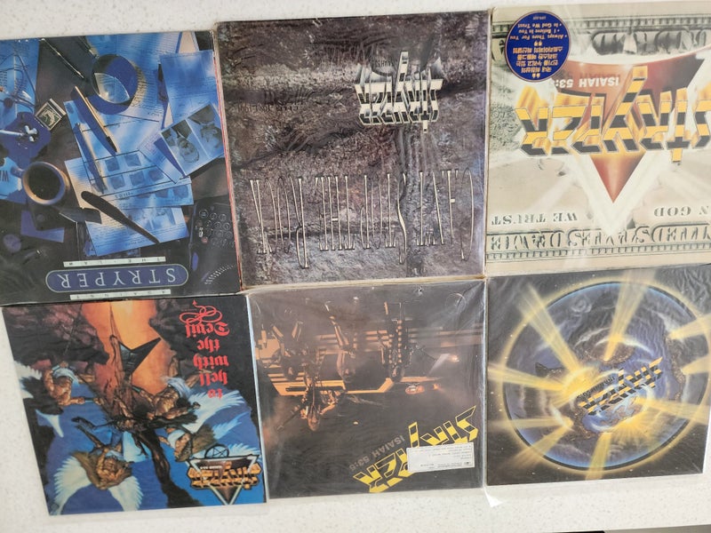 Stryper vinyl records Carousel 1