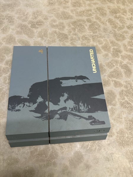 PS4 (Nathan Drake Edition) and 21 games Carousel 2