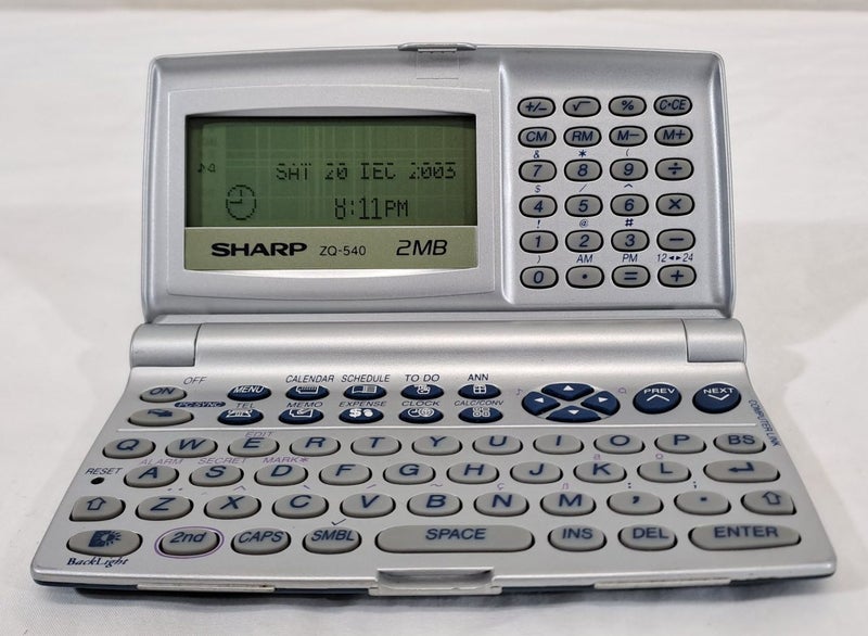 Sharp ZQ-540 Electronic Organizer Carousel 1