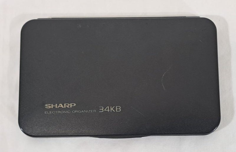 Sharp ZQ-1200A Electronic Organizer Carousel 2