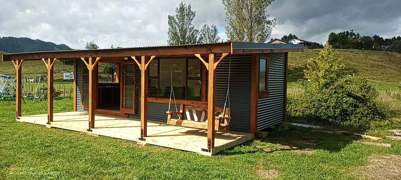 RUSTIC SELF CONTAINED PORTABLE CABIN Carousel 1