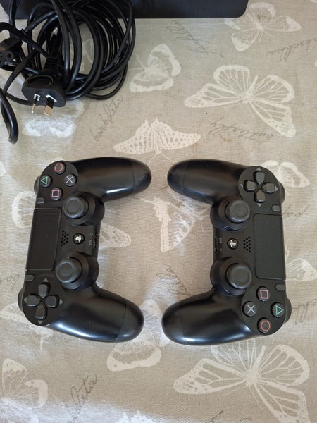 Playstation 4 console with 2 controllers Carousel 1