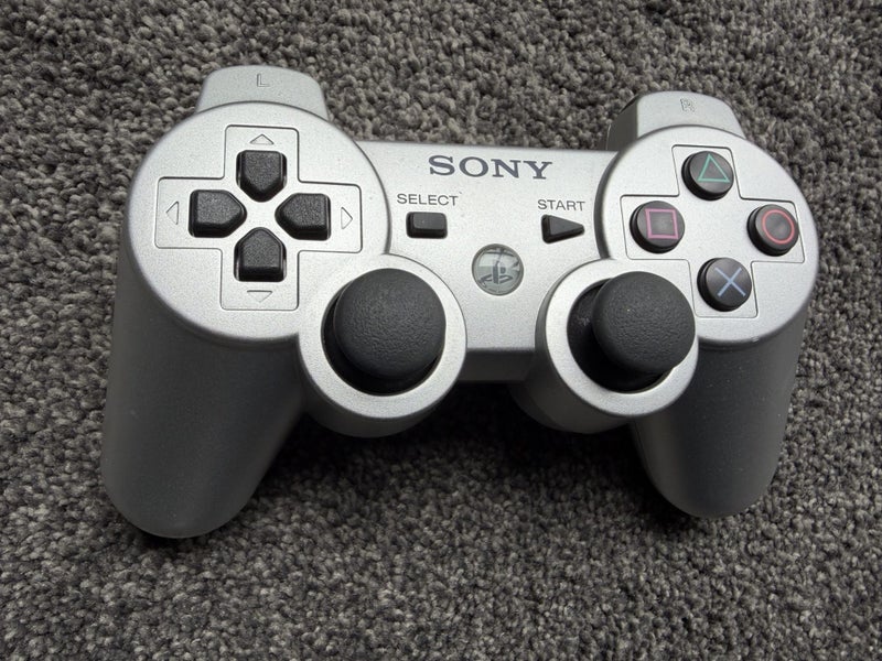Official PS3 Controller Silver Carousel 1