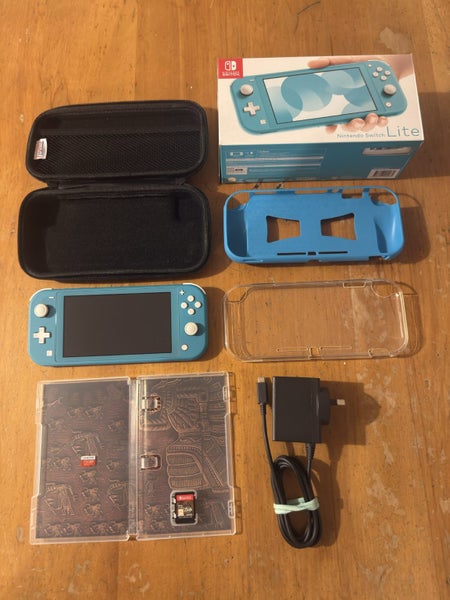 Nintendo switch lite with accessories Carousel 1