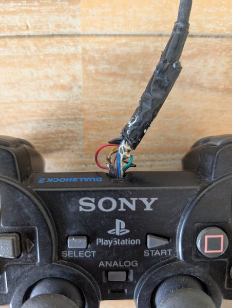 Playstation 2 (PS2) Controller: Black: Working Carousel 2