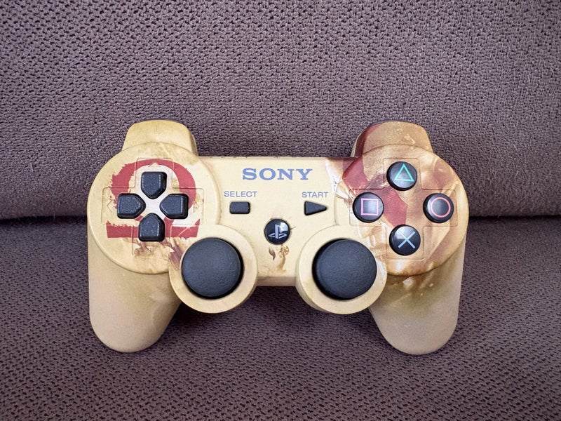 PS3 GOD OF WAR CONTROLLER + 2 STANDARD BLACK CONTROLLERS Carousel 1