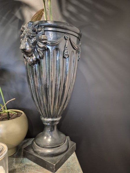 Large black loin detailed urn Carousel 1