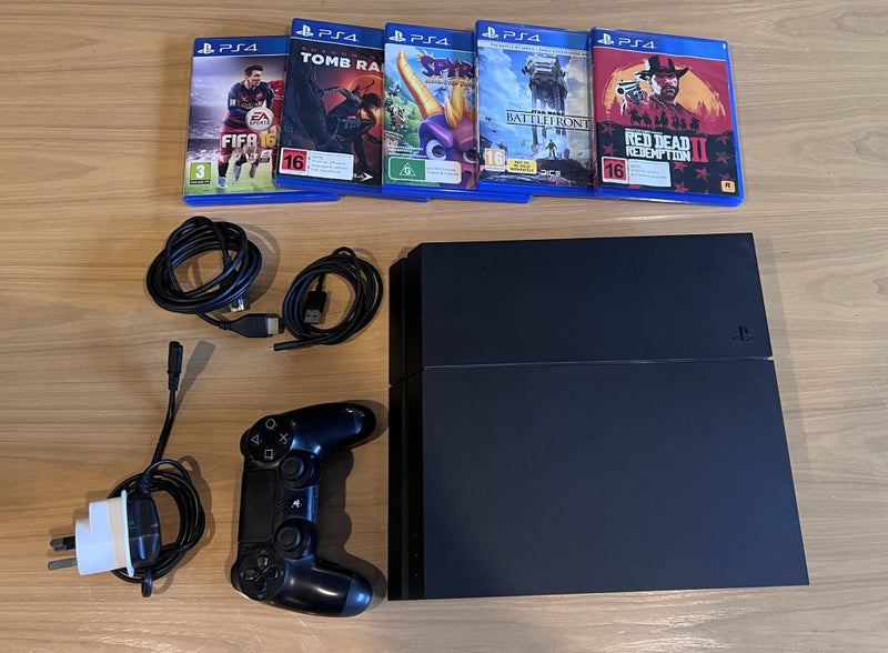 PlayStation 4 with Games Carousel 1