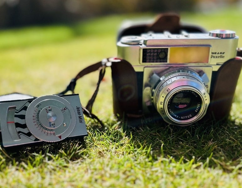 Braun numberg vintage paxette camera with jonin mini Carousel 1