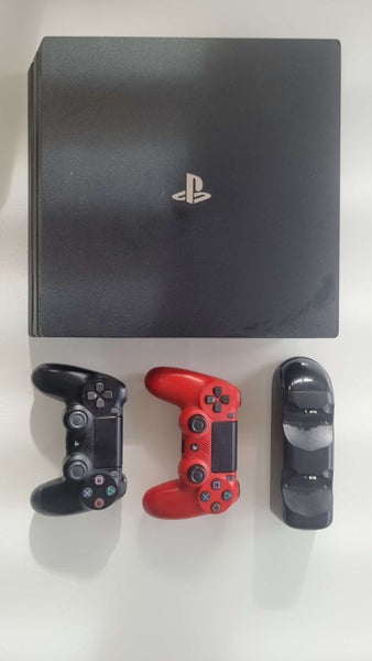 Playstation PS4 Pro with Controller and Charger Carousel 1