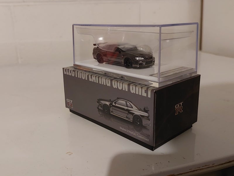 Motorhelix Nissan Skyline GT-R R34 Nismo Electro. Gun Metal - Limited Edition Carousel 2