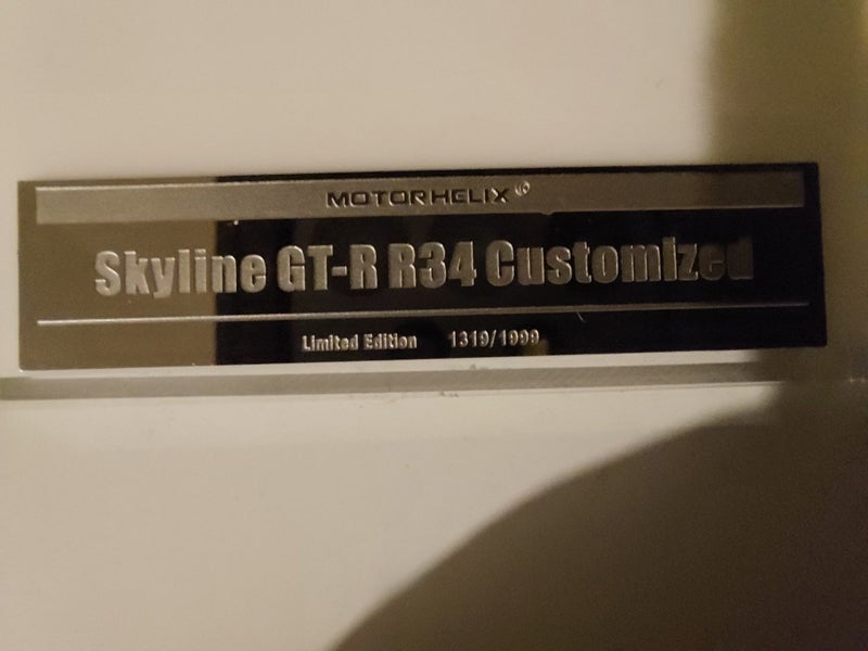Motorhelix Nissan Skyline GT-R R34 Nismo Electro. Gun Metal - Limited Edition Carousel 7