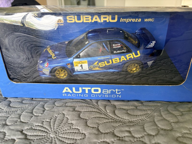 AUTOart 1:18 Possum Bourne Subaru Impreza WRC 1999 - Low #1061/3000 Carousel 2
