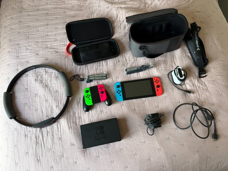 Nintendo Switch + Accessories + Ring Fit Carousel 1